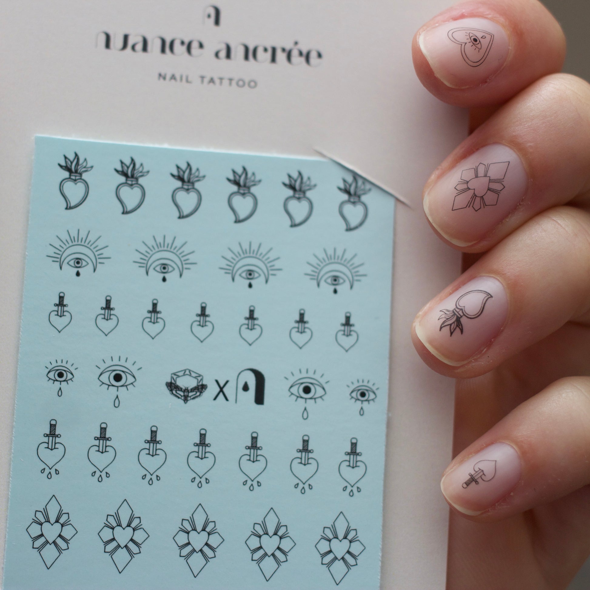 nail art coeurs ex voto coeurs sacrés nail tattoos